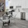 dining table and chairs in kitchen with windows