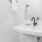 a bathroom with a mirror and sink