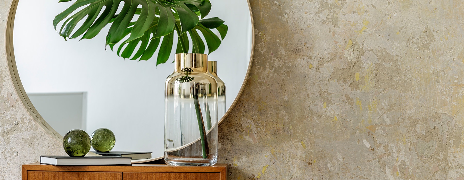 desk with plant and mirror