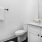 well lit bathroom with vanity